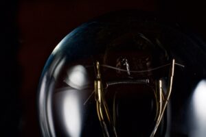 A dark light bulb with the power out