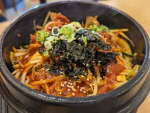 Korean comfort food served in a traditional stone bowl from Kimbab Cheonguk