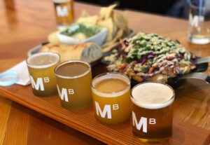 Beer flight with breads and dip at Mariner Brewing Company