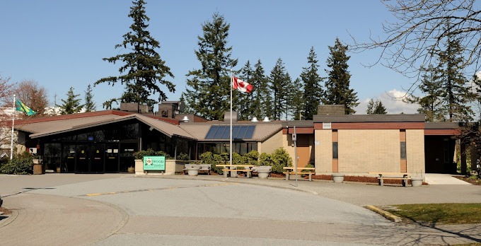 Entrance to the Dogwood Pavilion Seniors' Society building on a sunny day