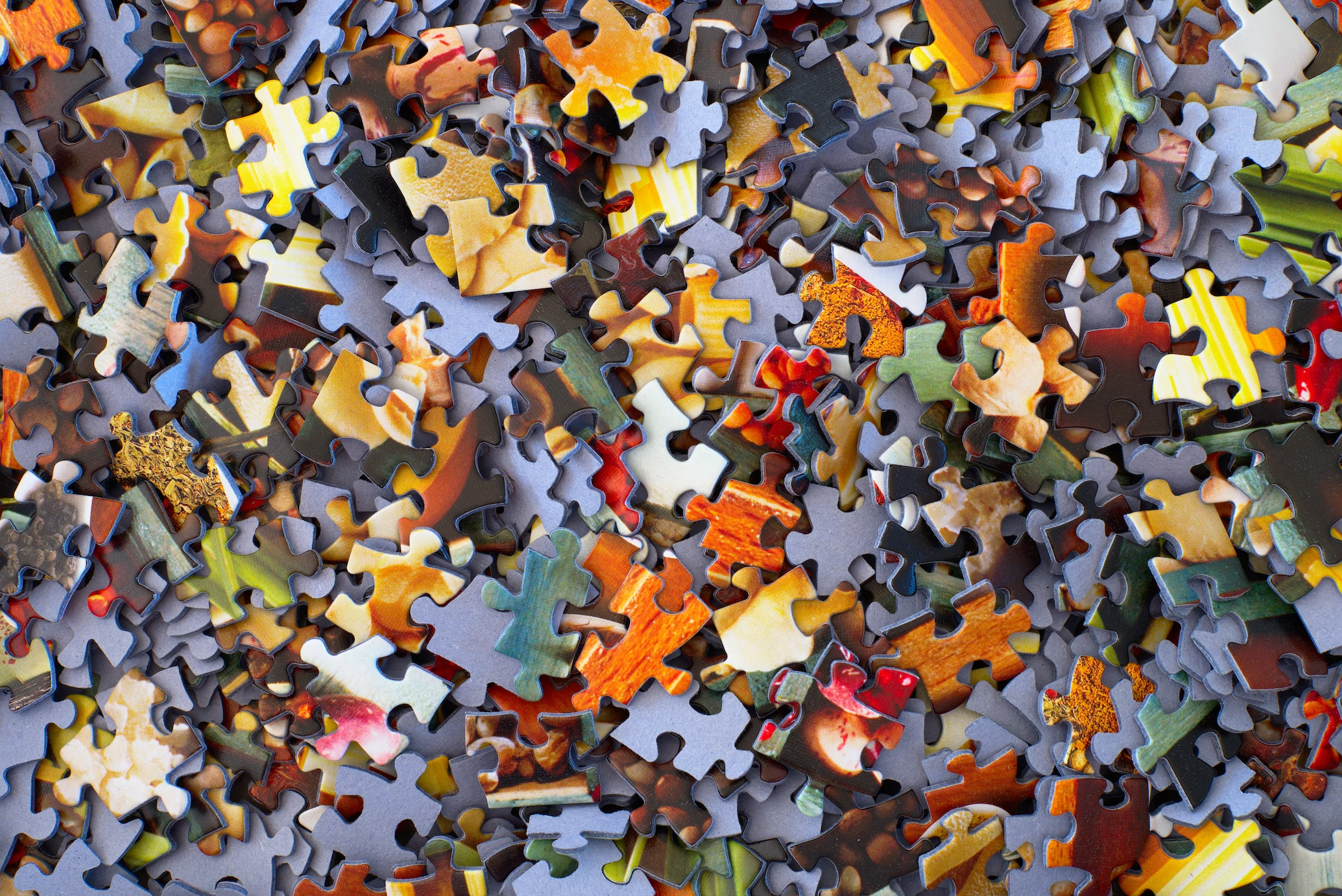 A jumble of jigsaw puzzle pieces