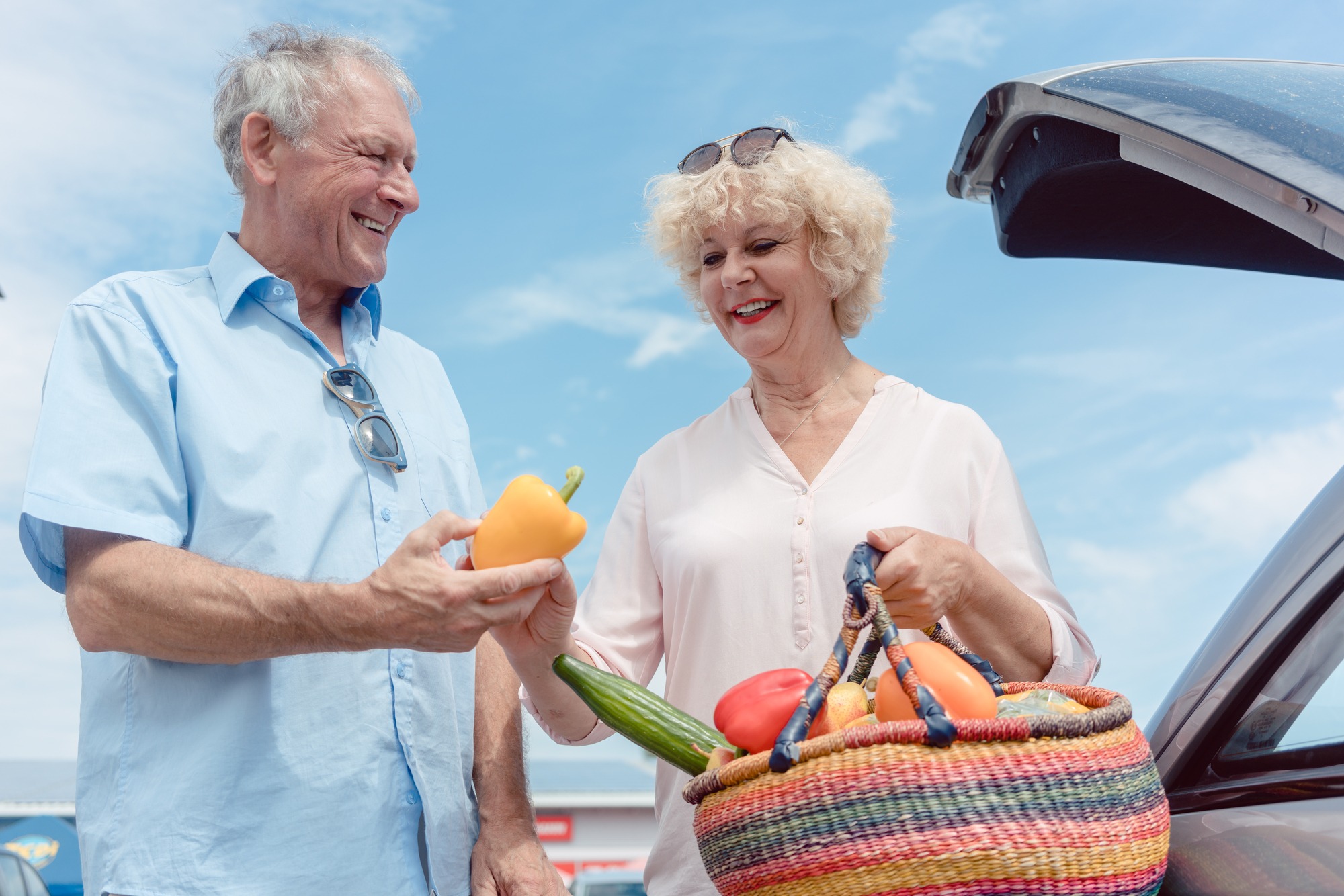 Senior couple with fresh and nutritious vegetables