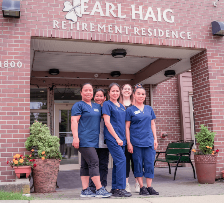 The wonderful staff memebers of SF Care Services standing outside the Earl Haig Retirement Residence