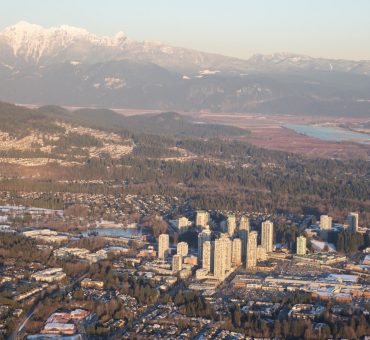 Aerial view of Coquitlam Center Mall during a vibrant sunset