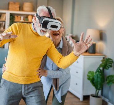 VR for 2 seniors at home having fun in their living room